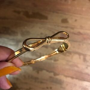 Gold Tone Bow Clamper Bracelet